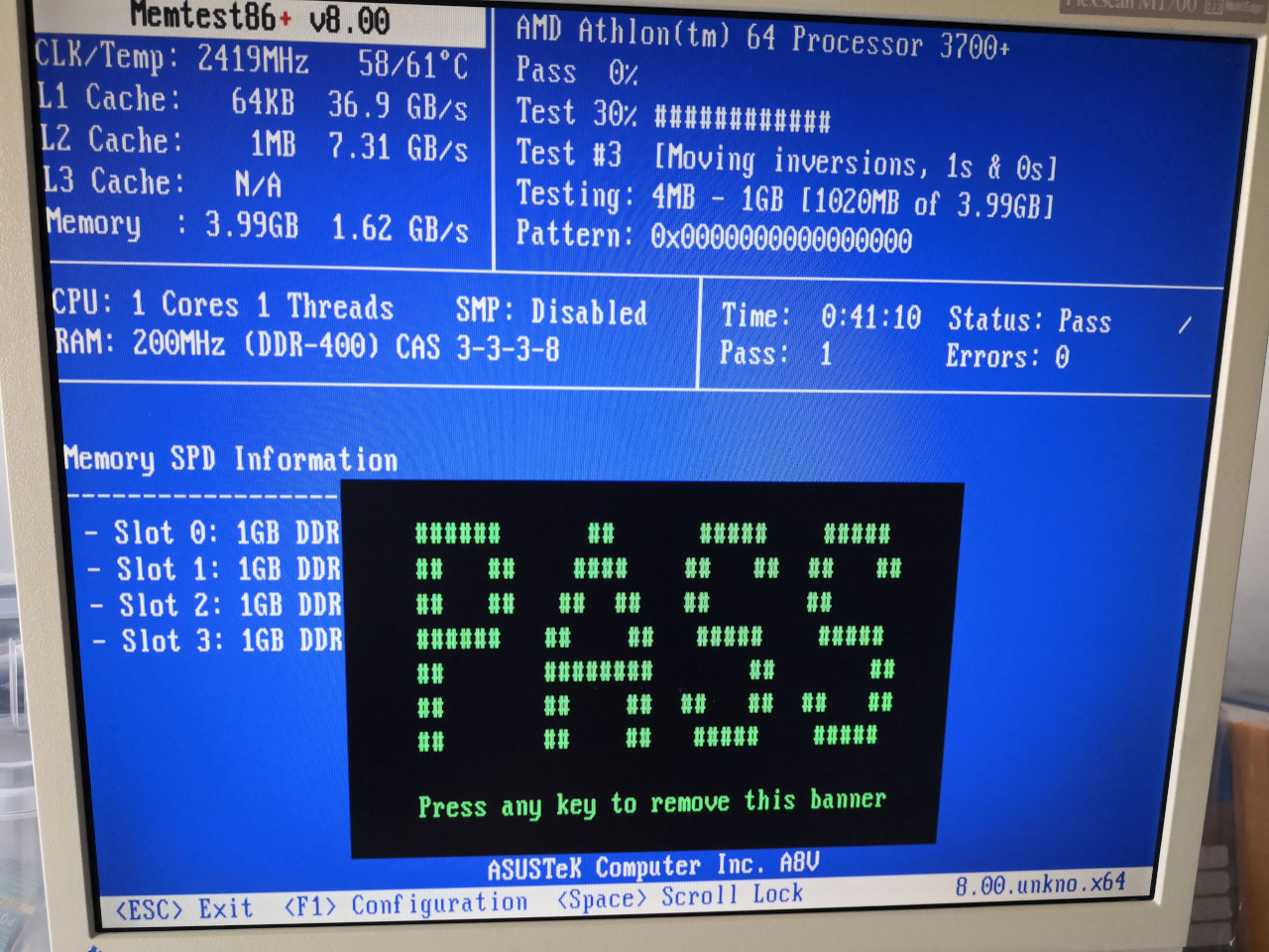 Memtest86+ running since 41 minutes. One round completed. Huge green ASCII art saying "PASS".
CPU clock at 2419MHz (10% overclock), temperature 61°C